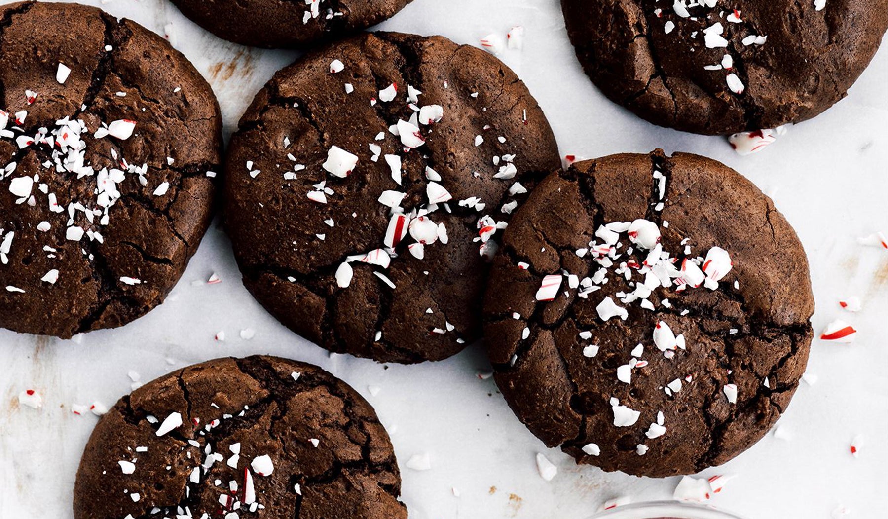 holiday crinkle chocolate brownie cookies with crushed candy cane peppermint topping